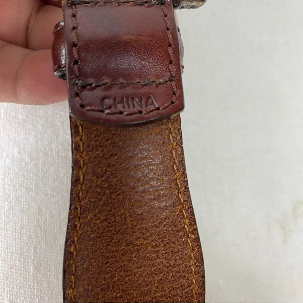 Fossil vintage leather and silver tone braided accents